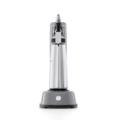Beverage dispense system with stainless steel dispenser and gray base on a white background